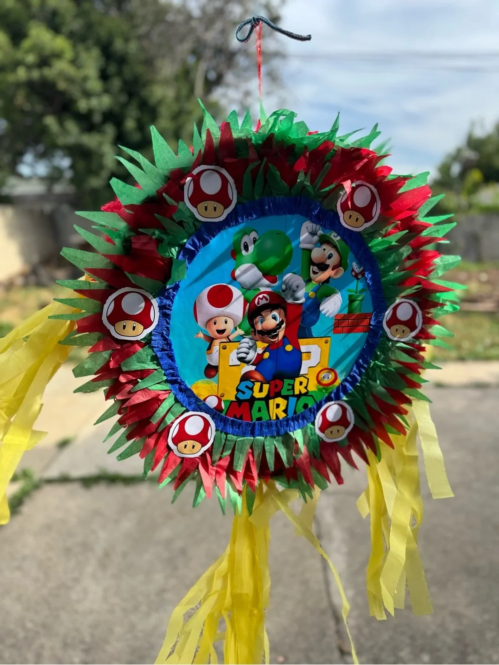Super Mario Red & Green Party Piñata with Yellow Streamers